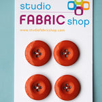 Rust-coloured buttons (23mm)